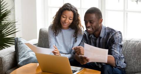 Couple Talking About High-Yield Savings Account