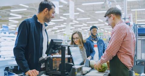 Grocery store employee with health insurance