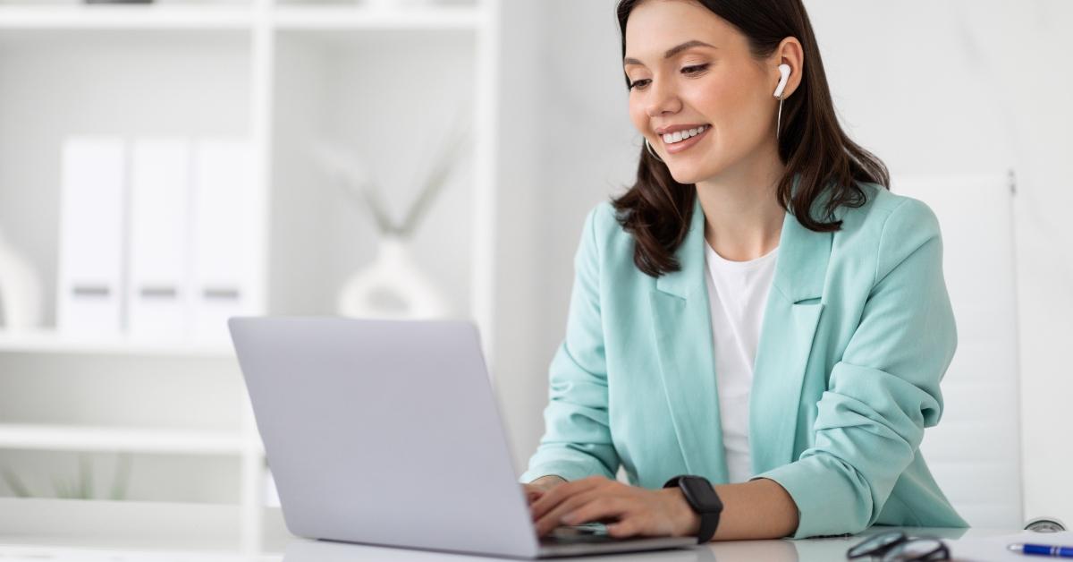 business lady in wireless headphones
