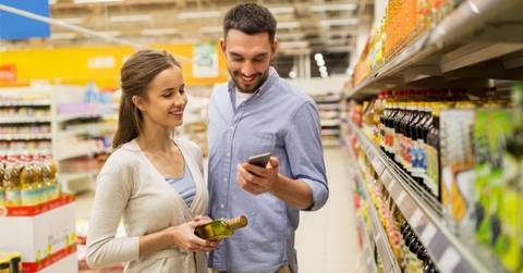 Couple earning cash back at Walmart