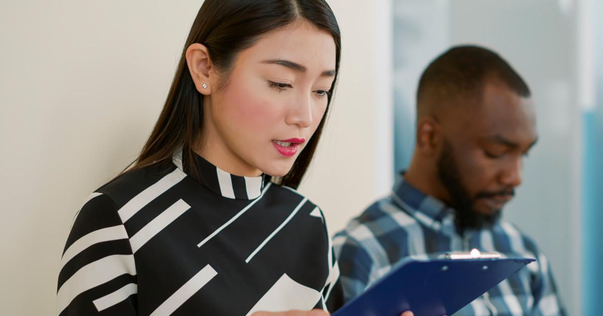female candidate looking at recruitment files