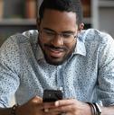 Man playing game on phone