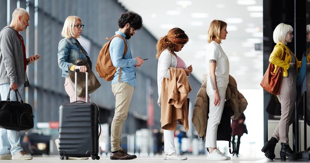People standing in line for airport security