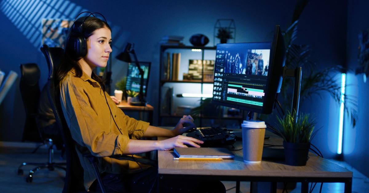 professional female video editor editing video