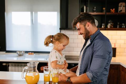 Smiling father with daughter