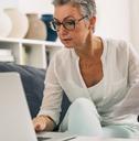 A woman researching debt inheritance