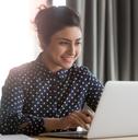woman researching on her laptop