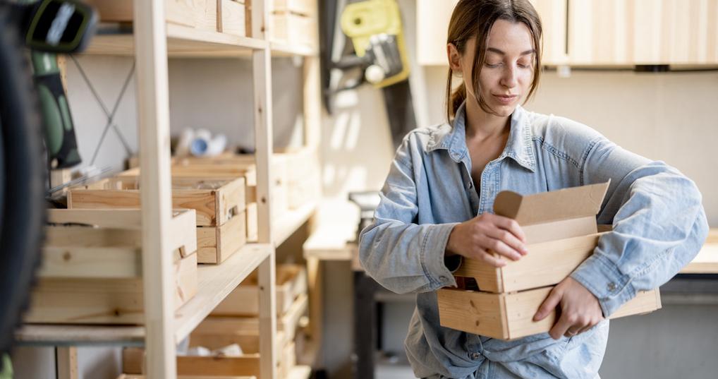 Woman storing things in garage