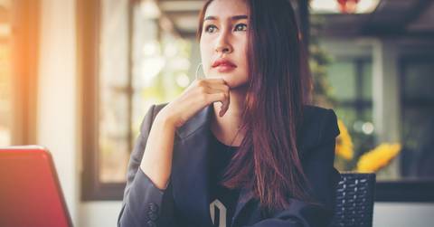 Woman Thinking About Credit Repair