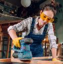 Woman sanding wood
