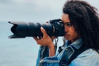 Woman taking a photograph
