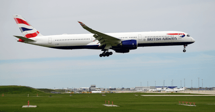 A British Airways plane lifts off the runway.