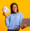 A woman holds a laptop in one hand and fans cash in the other. 